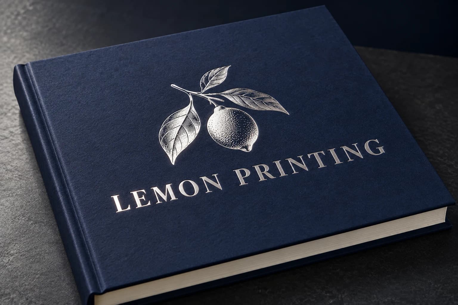 Silver-foil lettering on a navy printed book cover; AI-generated finish illustration for Lemon Printing